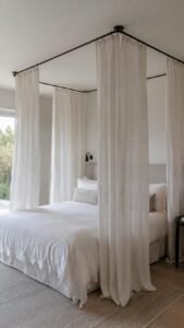 Frame the Bed with a Ceiling Mounted Canopy