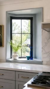 Window Reveal Decor With Color, Glass, and Small Collections